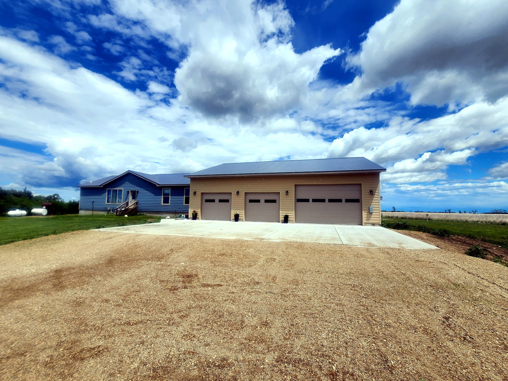 Home and attached three-stall garage built by Granum Construction